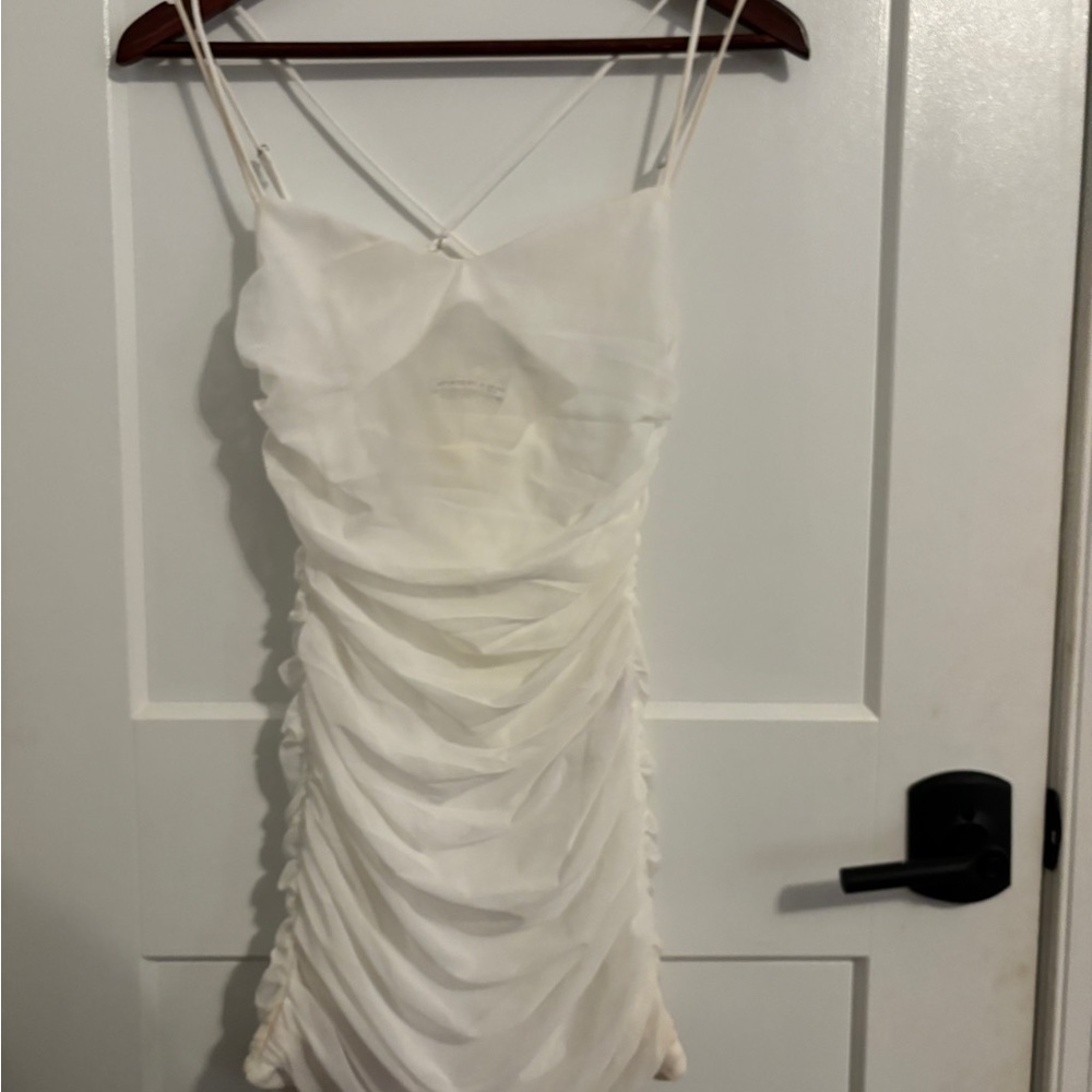 Meshed Ruched Bodycon Dress 
Lucy in the Sky 
Mini white dress with ruffles